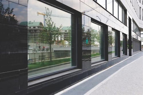 Clean Black Building With Glass Panels